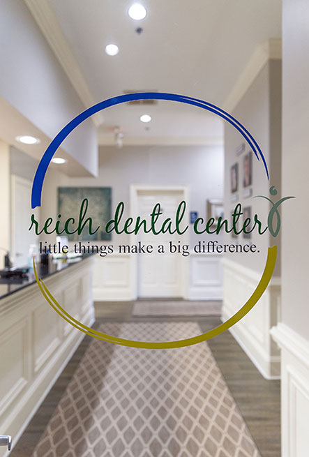 Logo of Reich Dental Center Roswell location.